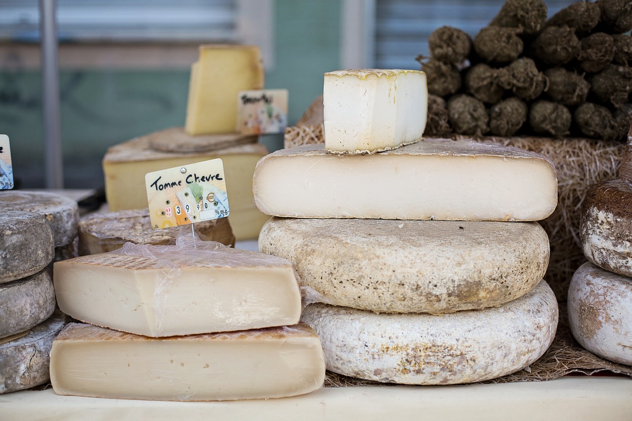 cheeses, stack of cheeses, france